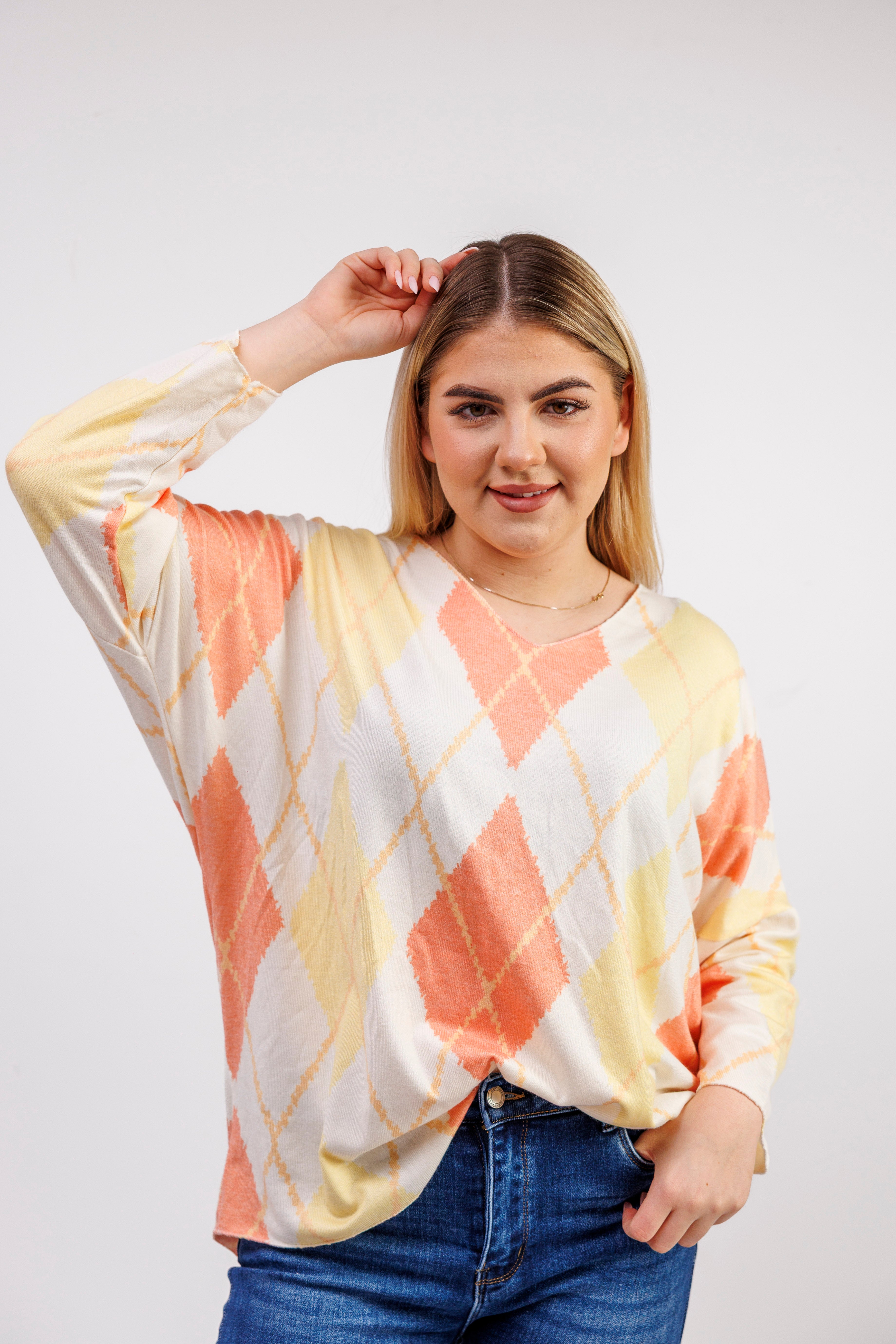 Dzianinowy sweter damski w romby Pomarańczowy