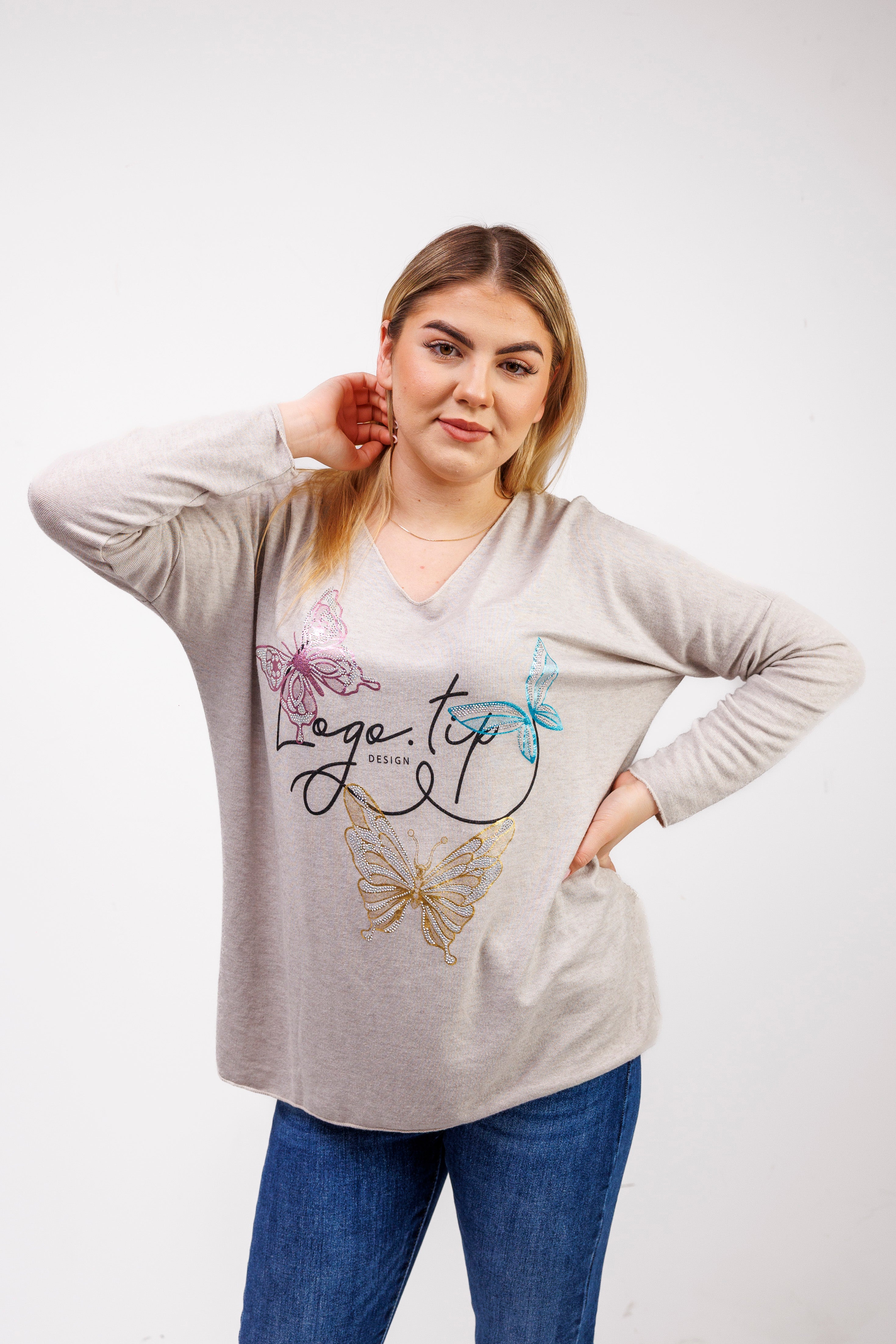 Sweterek z dekoltem V i ozdobnymi motylami Jasny Beż