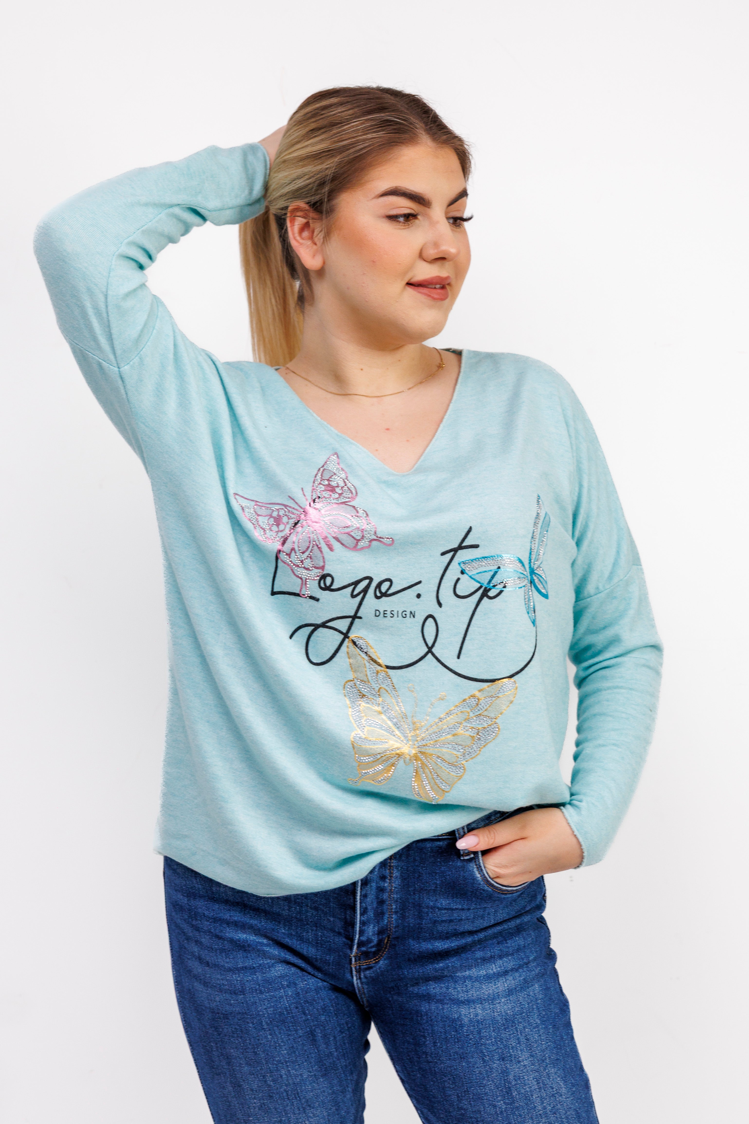 Sweterek z dekoltem V i ozdobnymi motylami Mięta