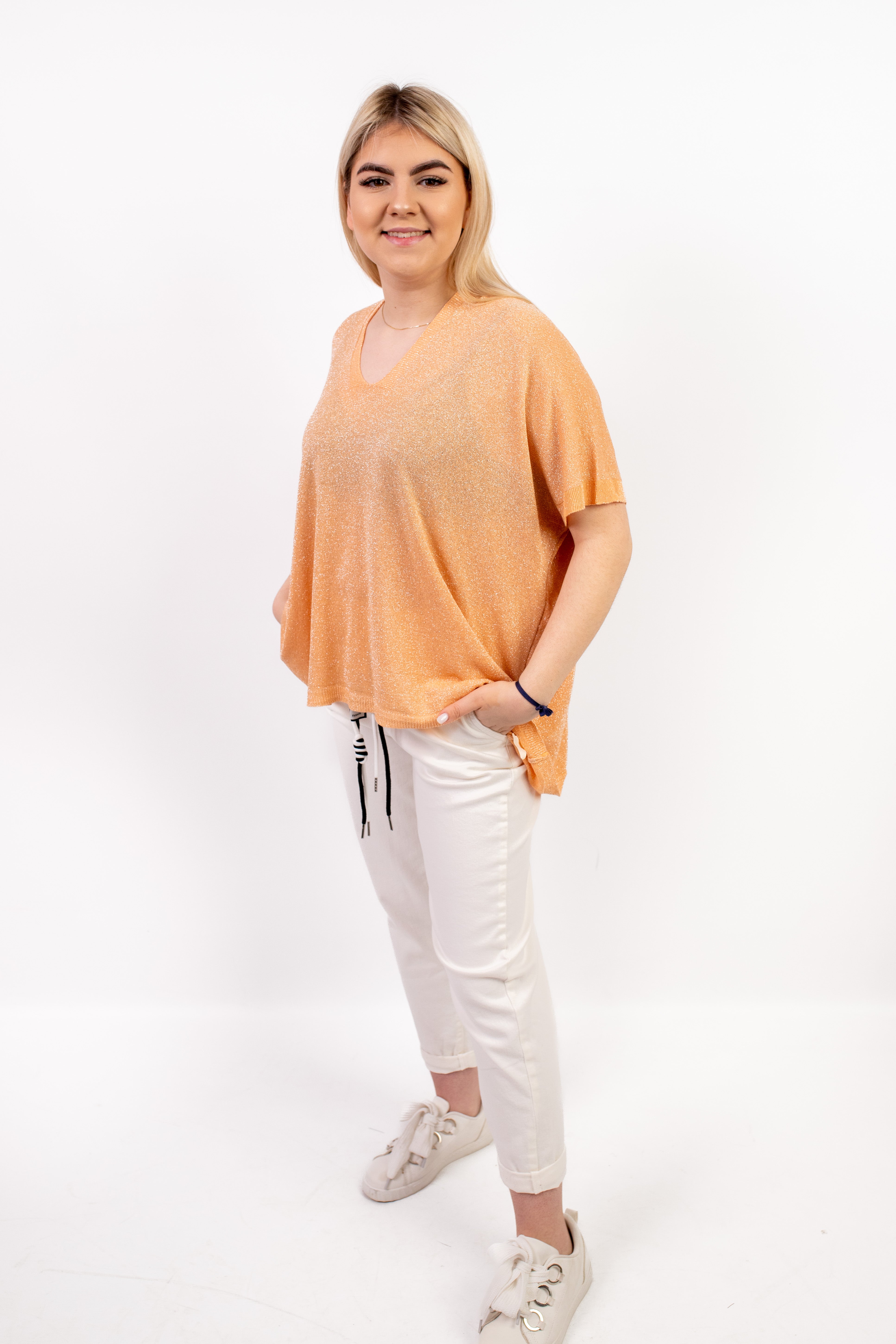 Włoski sweter damski oversize ze srebrną nitką Pomarańcz