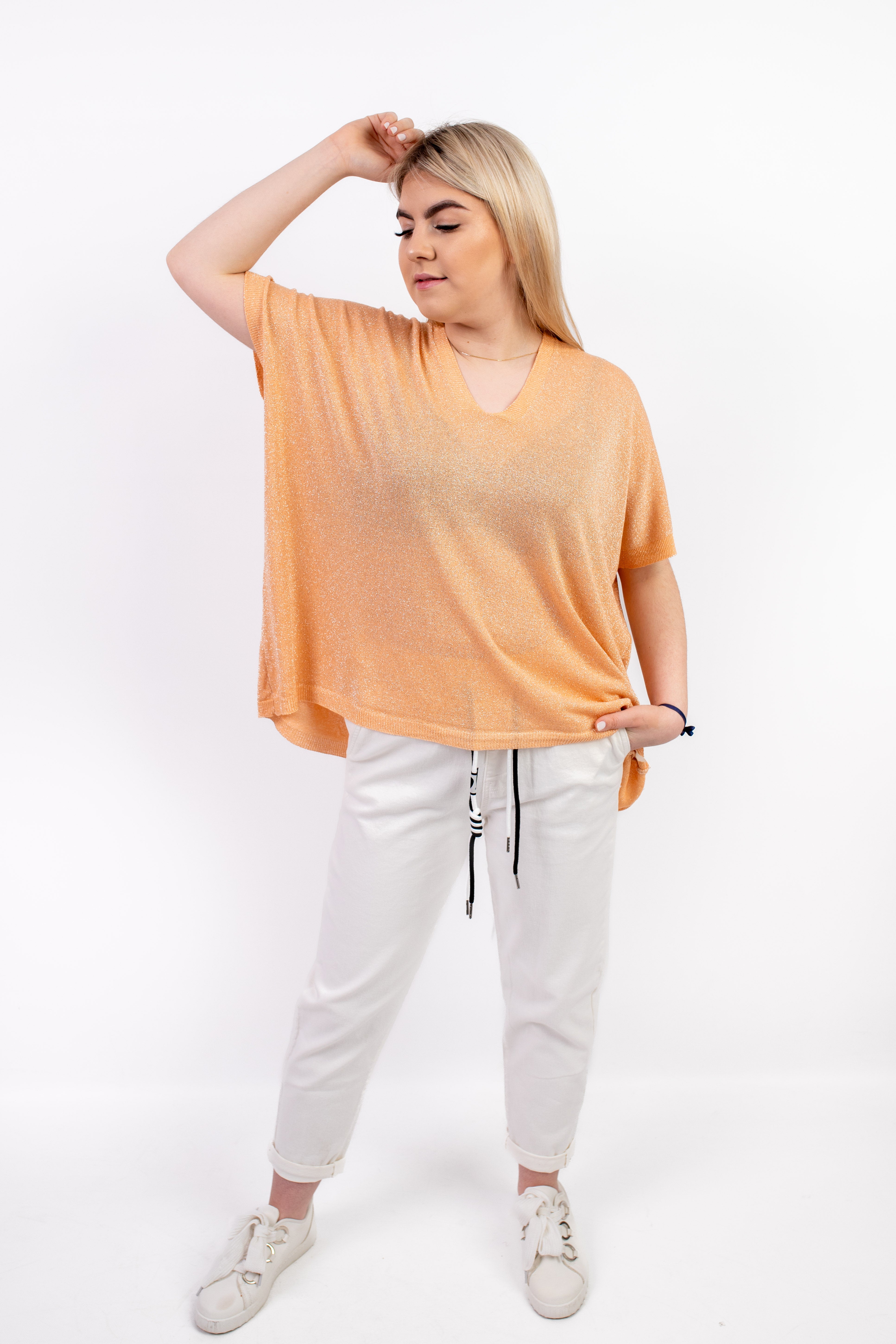 Włoski sweter damski oversize ze srebrną nitką Pomarańcz