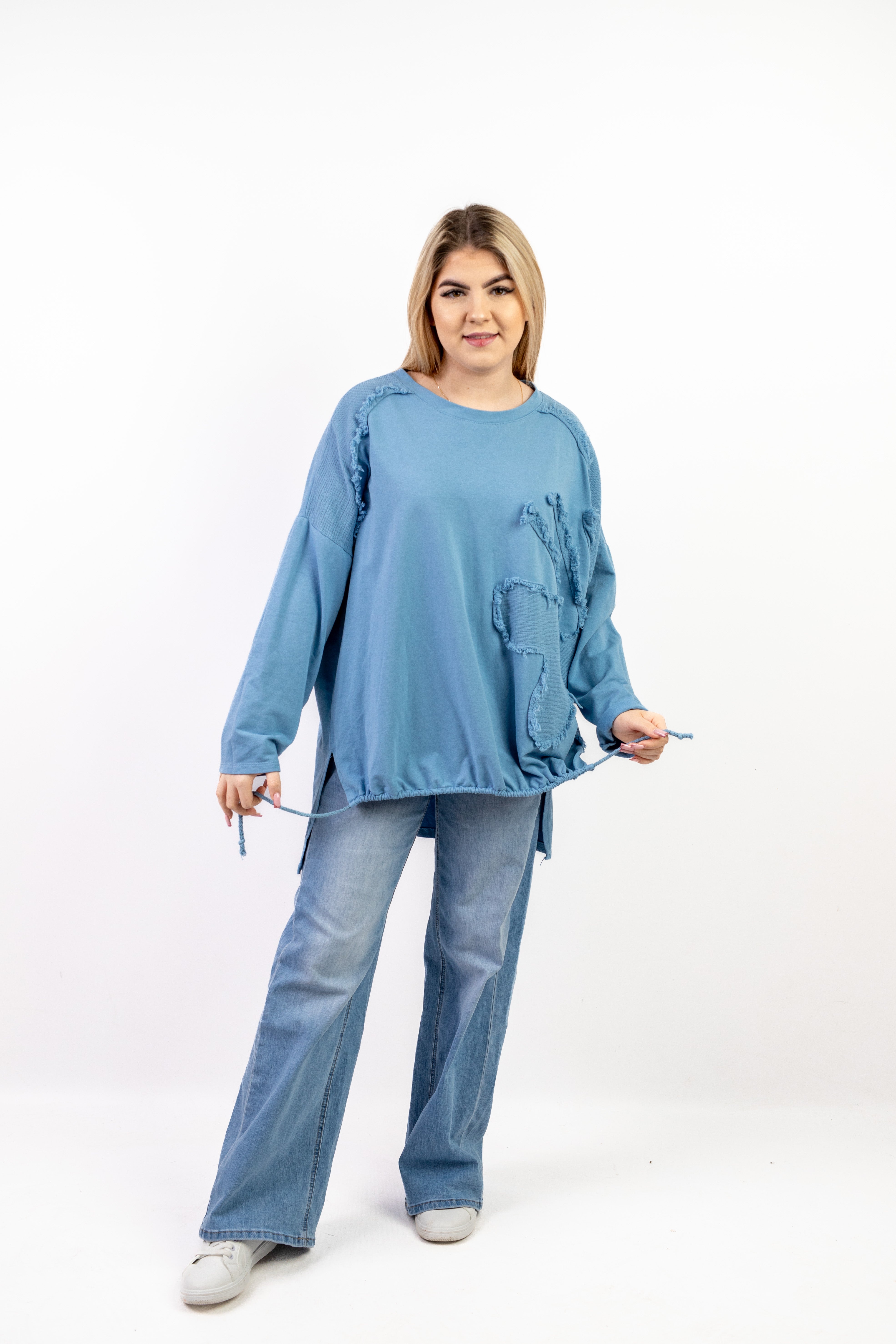 Włoska bluzka oversize z dekoracyjnymi przeszyciami i regulowanym dołem Błękit