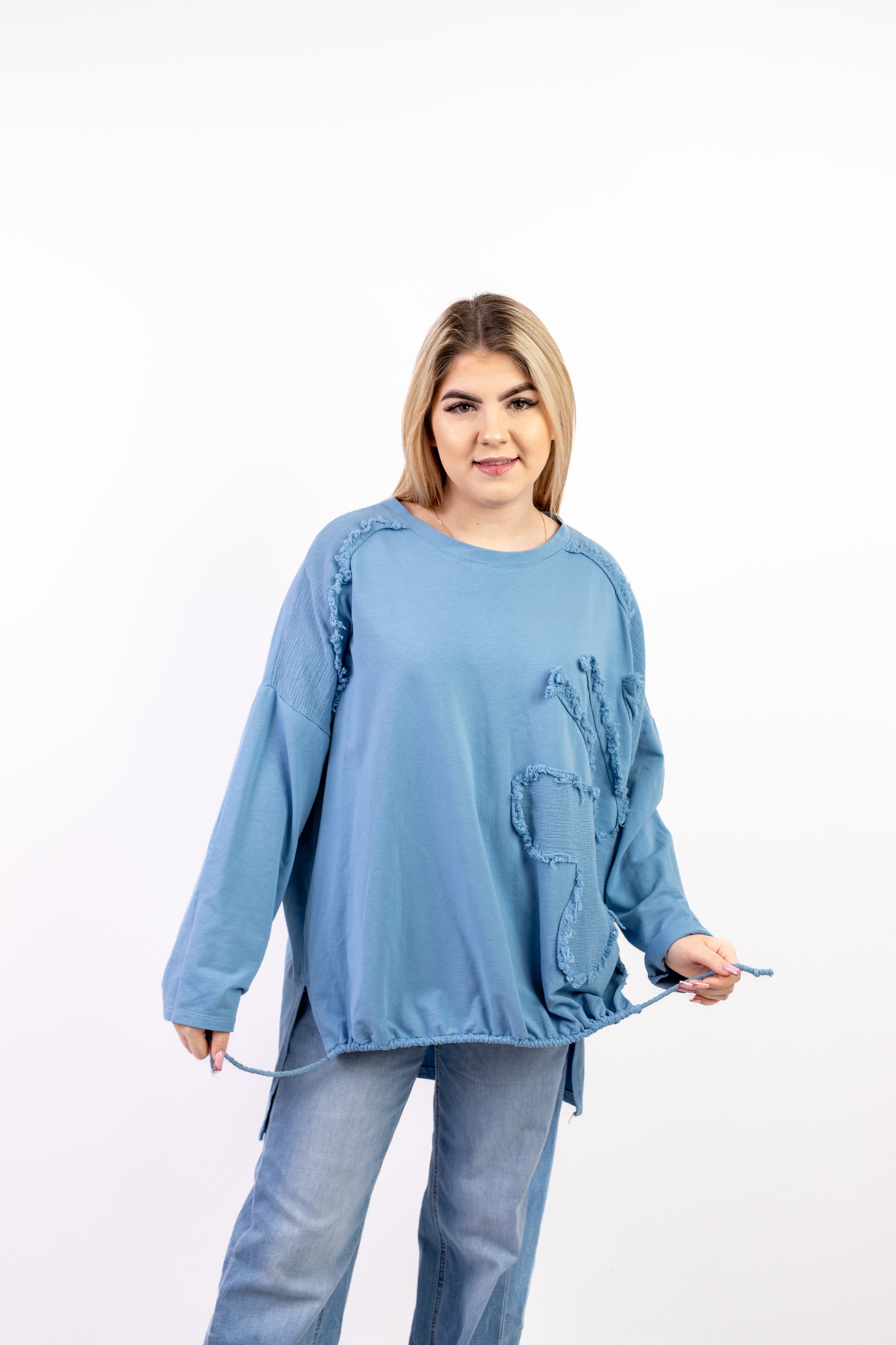 Włoska bluzka oversize z dekoracyjnymi przeszyciami i regulowanym dołem Błękit