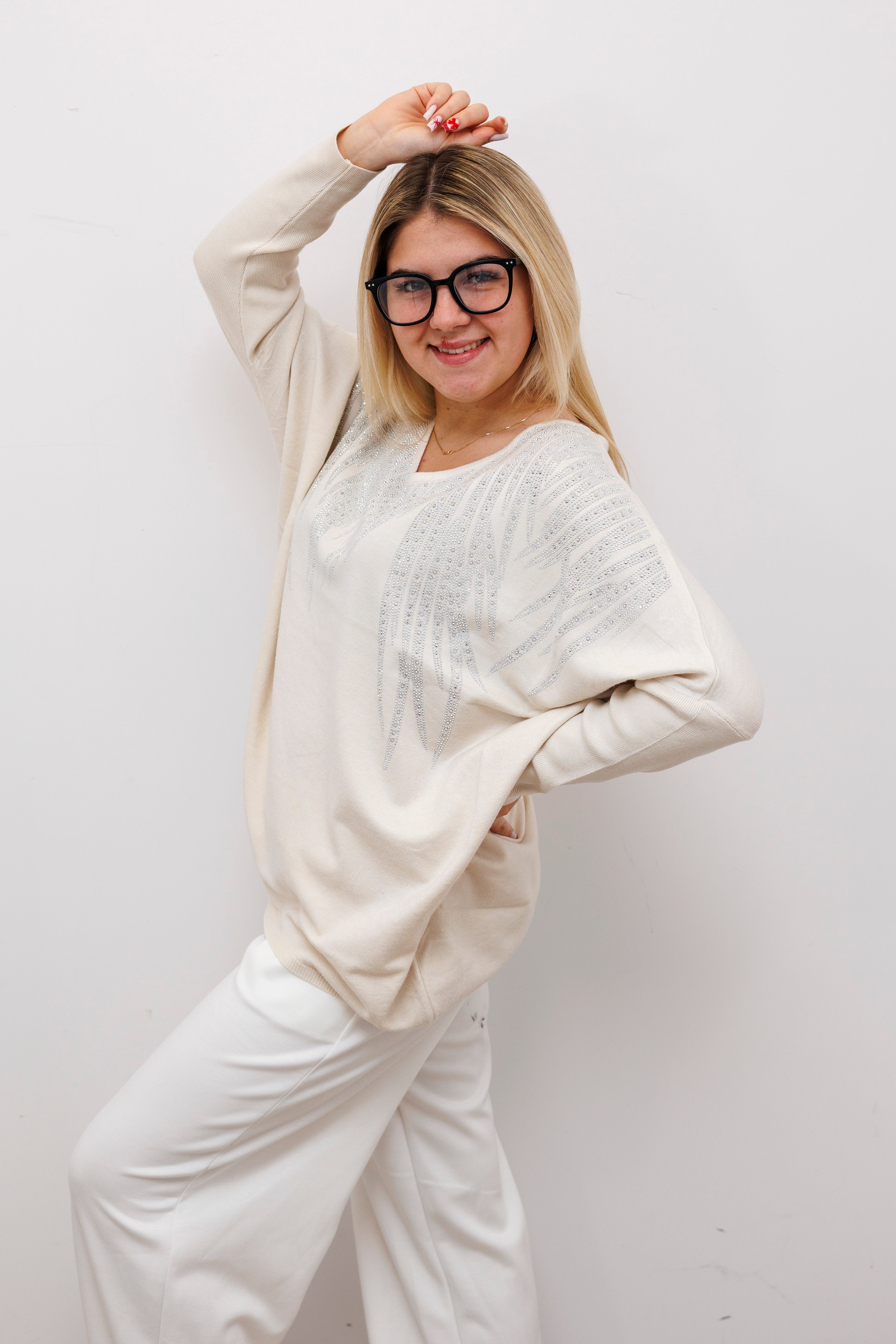 Stylowy sweter z dekoltem V Krem