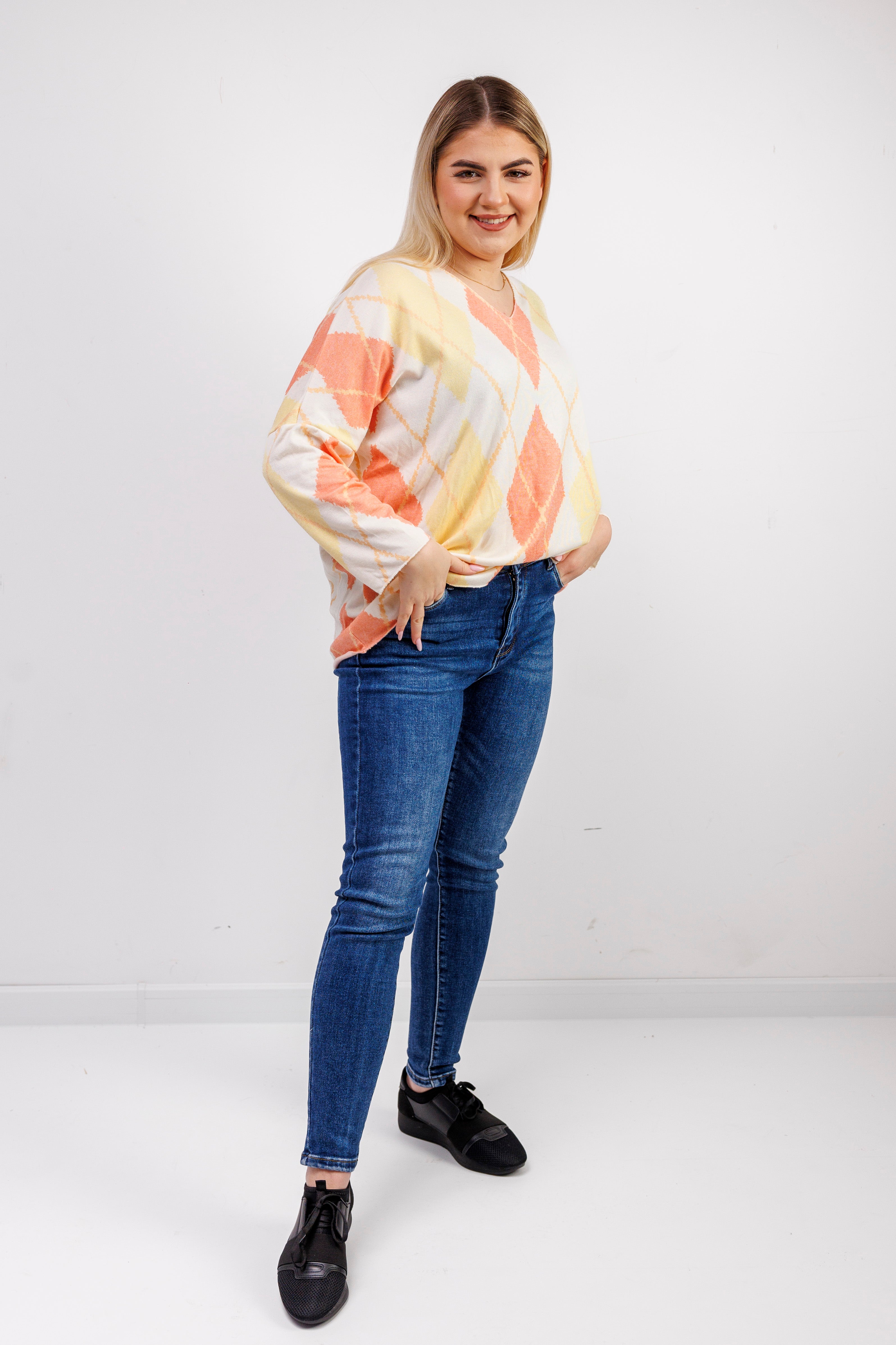 Dzianinowy sweter damski w romby Pomarańczowy