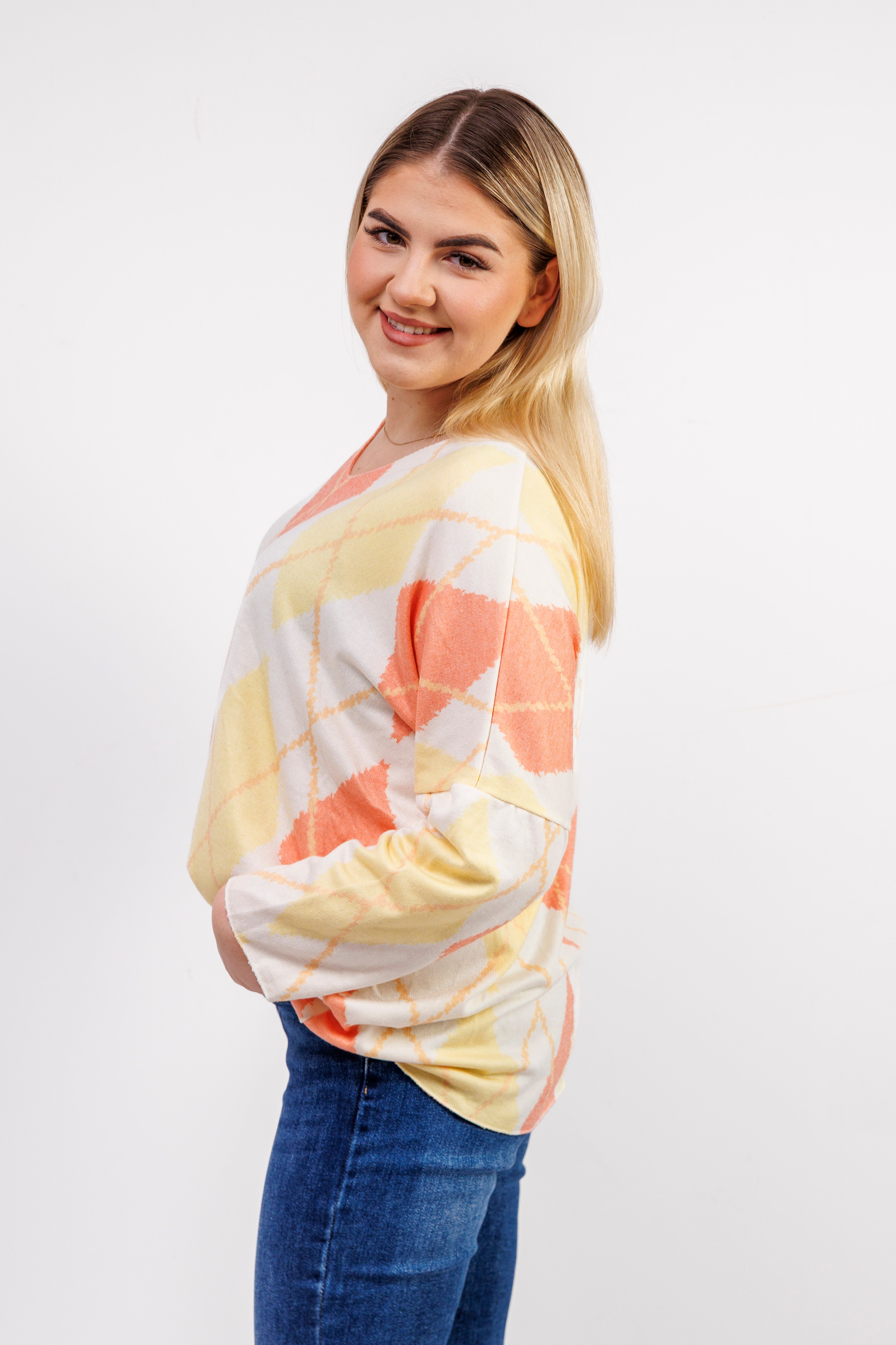 Dzianinowy sweter damski w romby Pomarańczowy